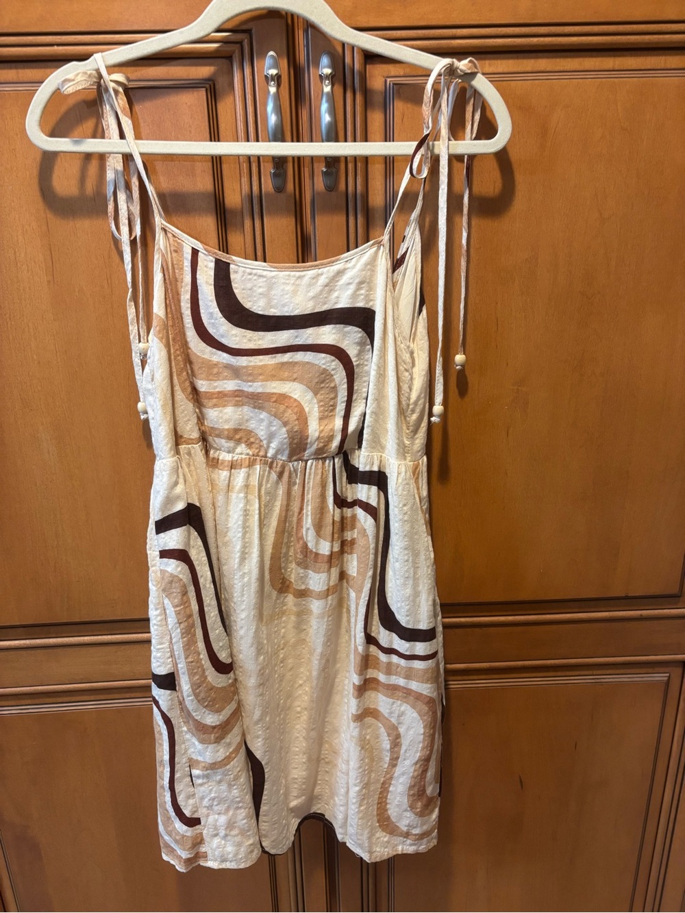 ILLA ILLA Cream Mini Dress with Brown Wave Print. Size: S